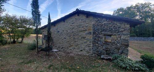 Travaux de rénovation sur mur en pierre à Saint Antonin Noble Val